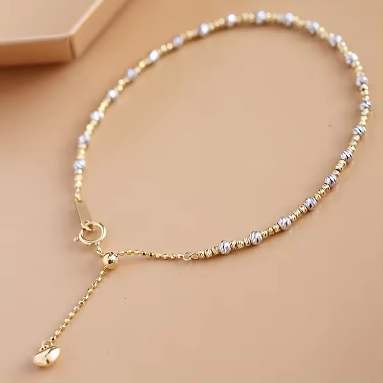 Pulseras con bolitas de 2 oros