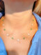 Collar único combinado esmeralda y corazones